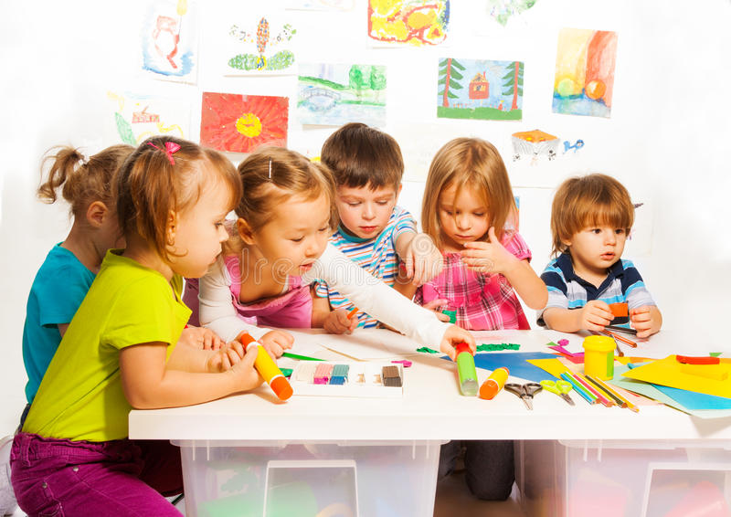 group-happy-kids-painting-large-little-class-sitting-together-pencils-paints-38747345